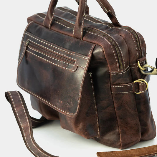 Side angle of premium leather work bag showcasing durable construction and business-ready design.