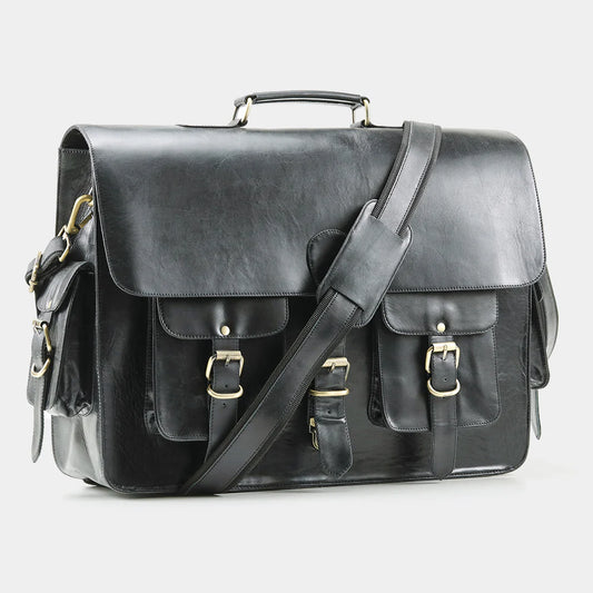 Black full-grain leather messenger bag with adjustable shoulder strap for business professionals.