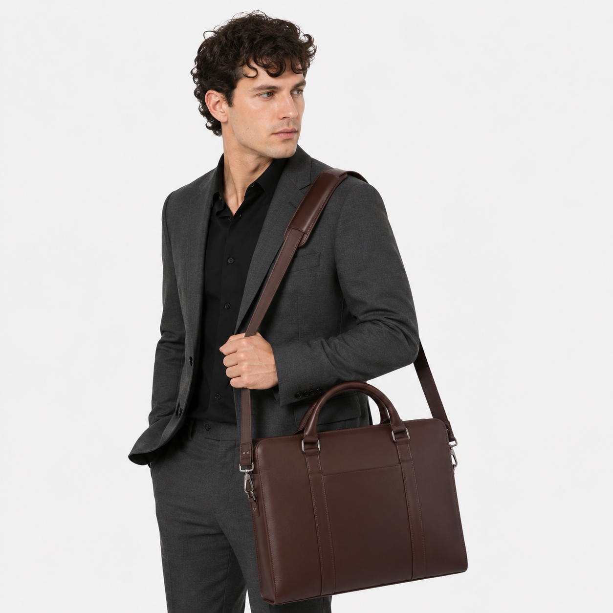 Business professional carrying a premium leather briefcase for office, meetings, and business travel.