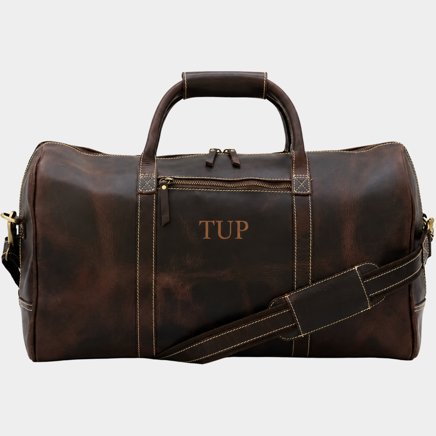 Brown leather carry-on duffle bag handcrafted from premium top grain leather for weekend and business travel