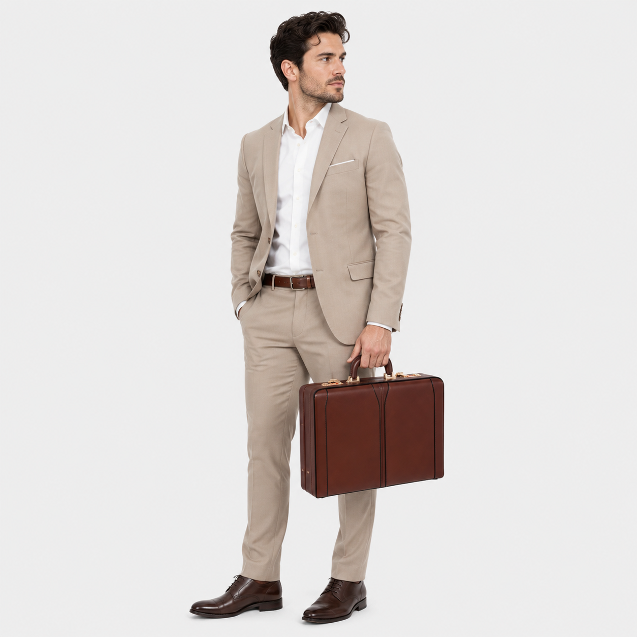 Professional carrying the Belmont leather briefcase during a business commute.