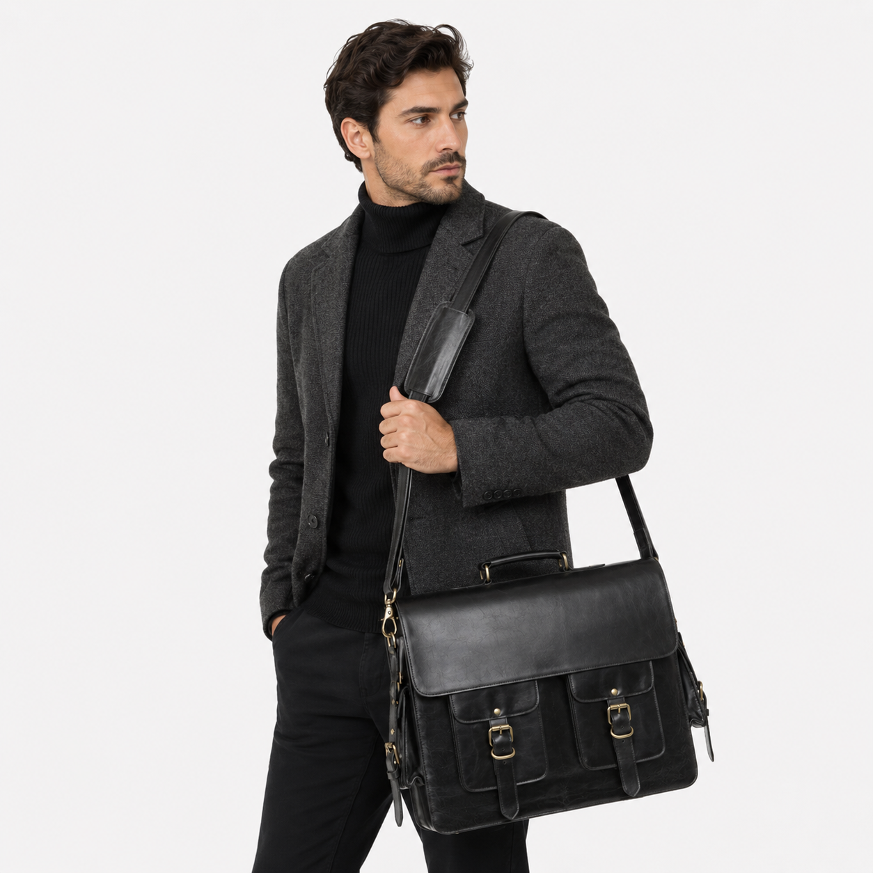 Black leather messenger bag worn by a professional for office and business travel.