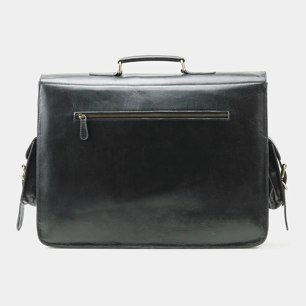 Side profile of luxury black leather messenger bag showing structured design.