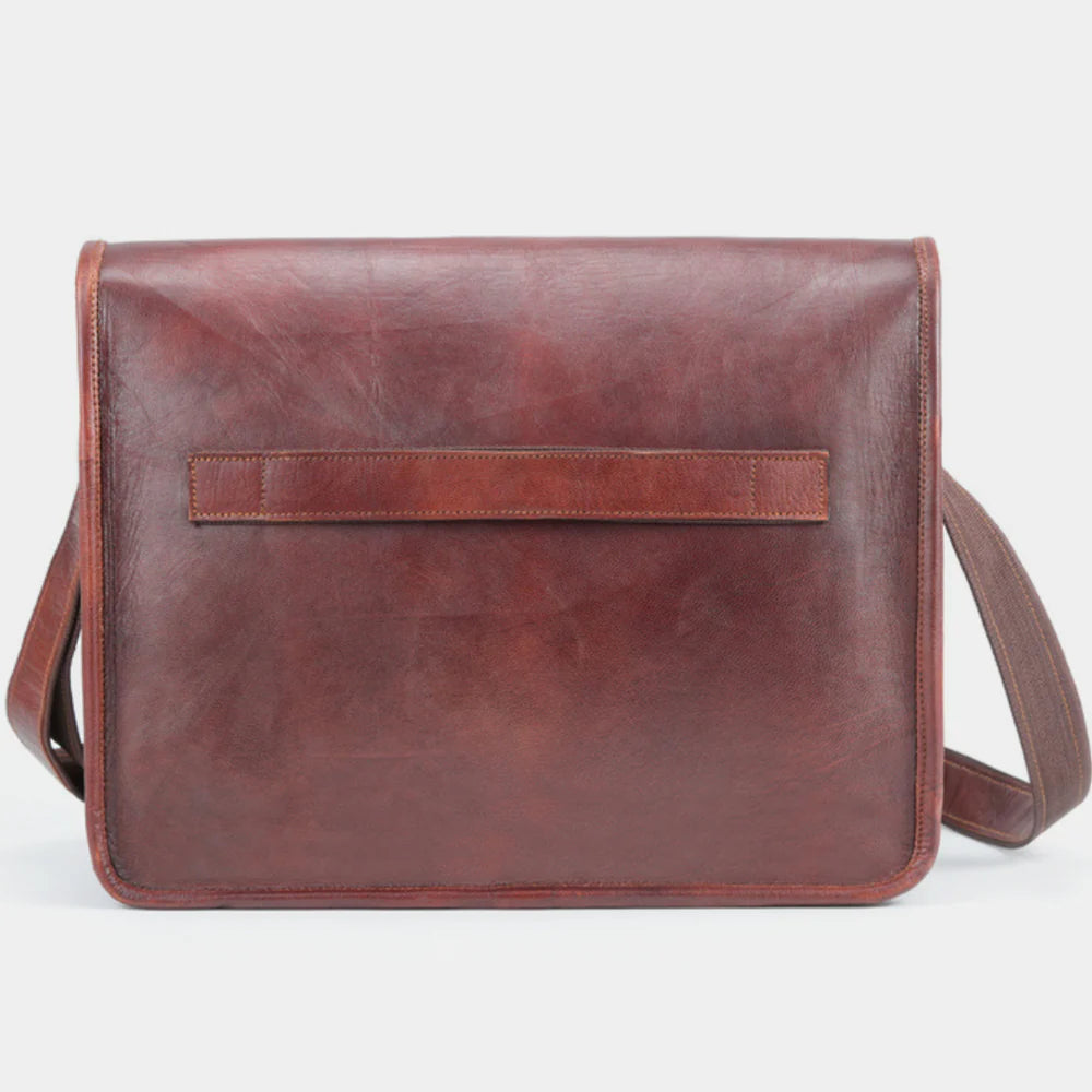 Back view of premium leather messenger bag with clean minimalist design and adjustable strap.