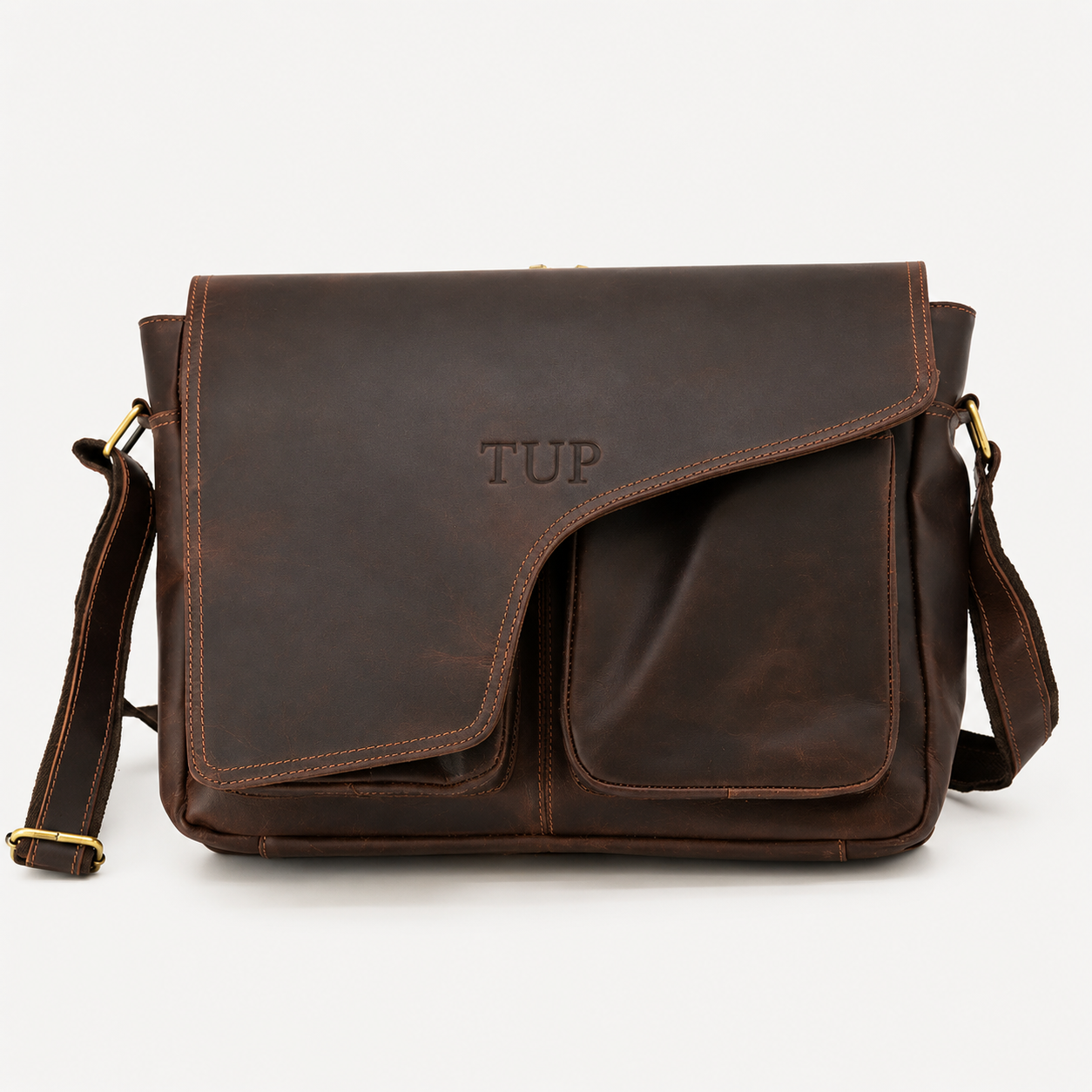 Front view of handcrafted brown leather messenger bag with spacious flap pocket.