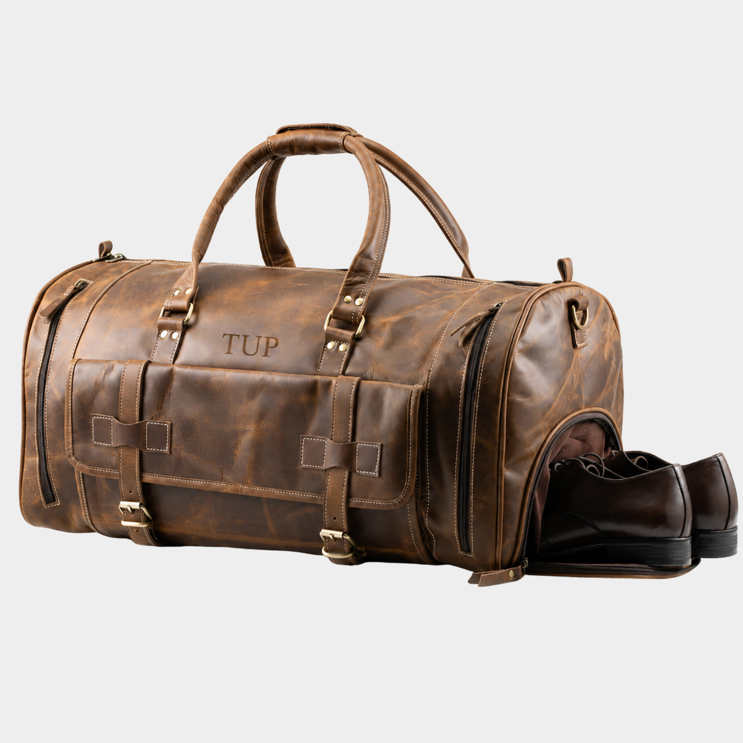 Side view of handcrafted leather weekender bag showing spacious travel design