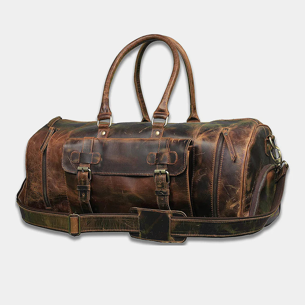 Angled view of full grain buffalo leather duffle bag with reinforced leather handles