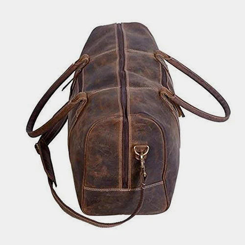 Top view of luxury buffalo leather weekender bag showing premium handles and zipper closure