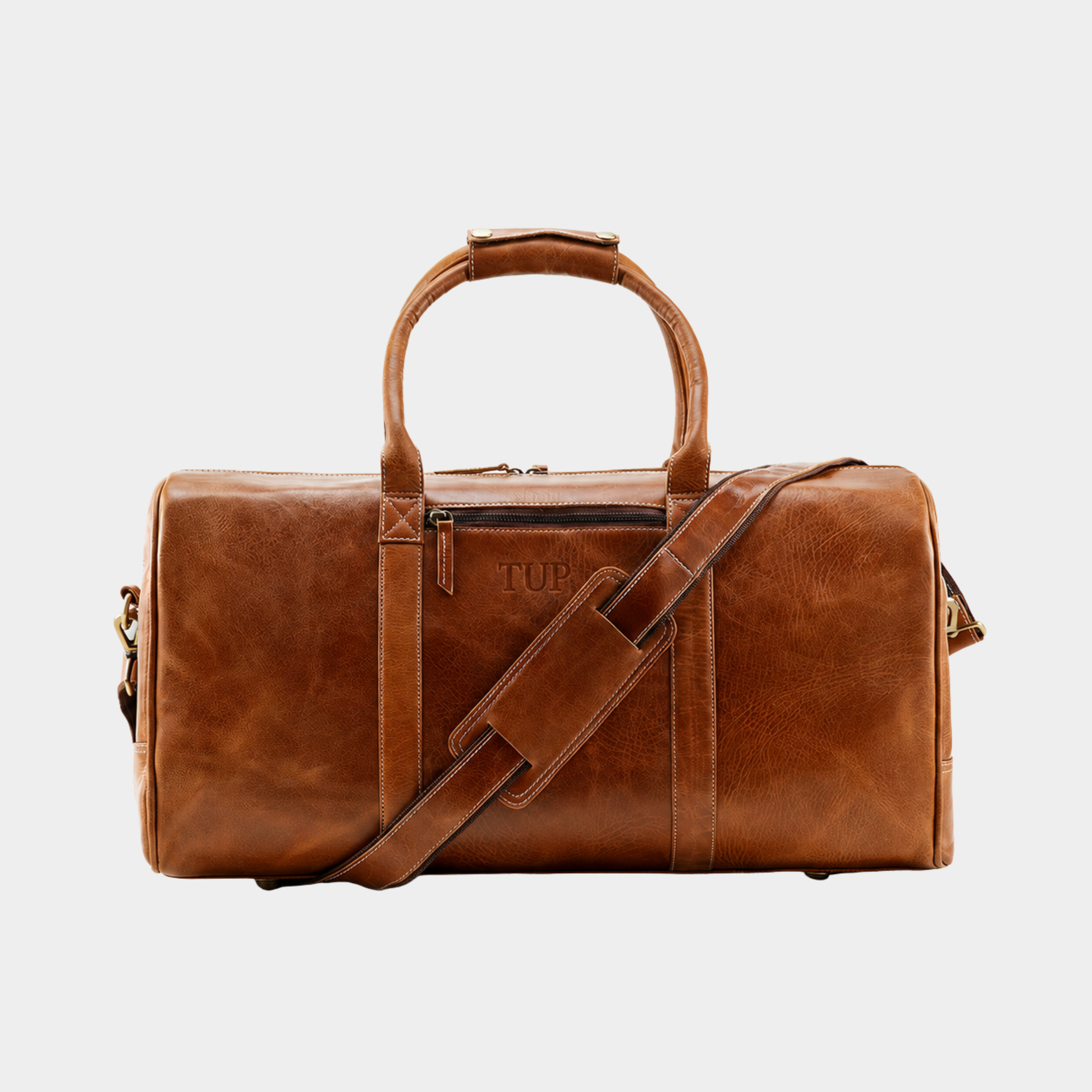 Hudson premium full-grain leather duffle bag with detachable shoulder strap for travel and weekend trips.