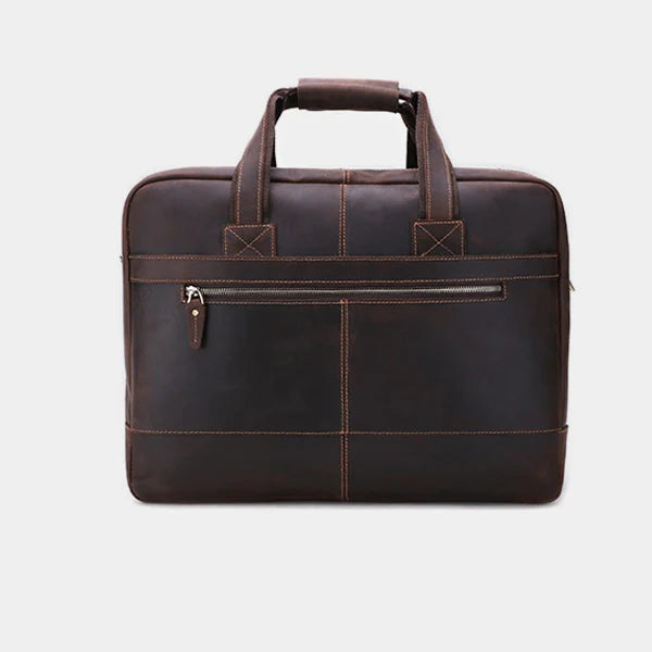 Front view of handcrafted leather messenger bag featuring durable handles and premium stitching.