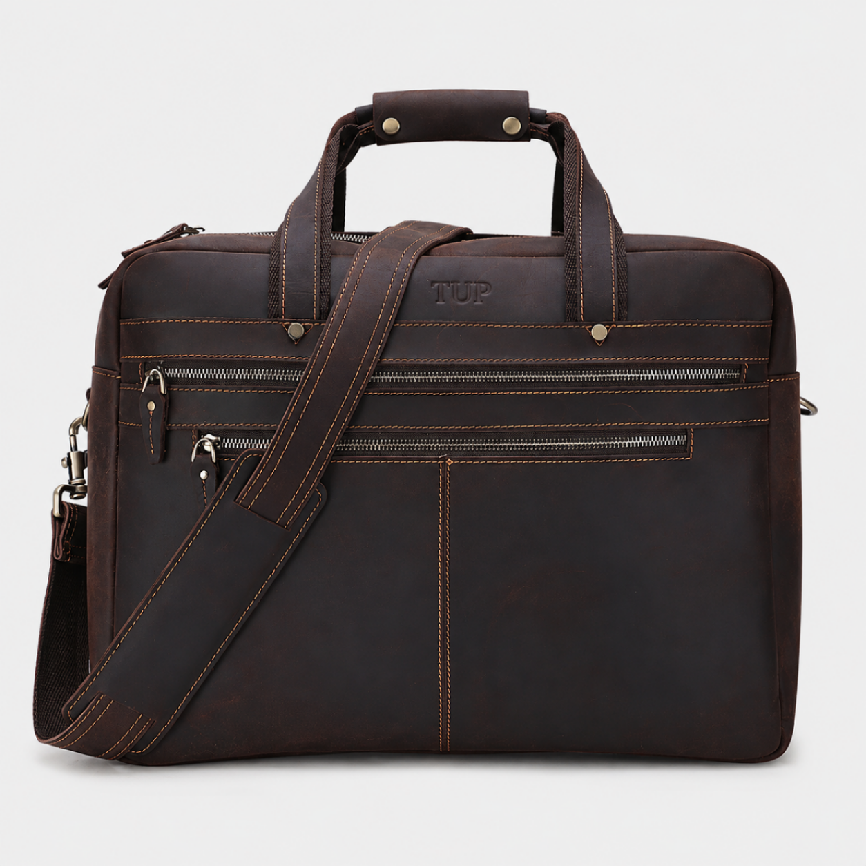 Premium brown leather messenger bag with adjustable shoulder strap and multiple zip compartments for work and business travel.
