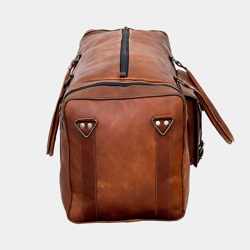 Front view of luxury brown leather travel duffle bag handcrafted by The Urban Parcel