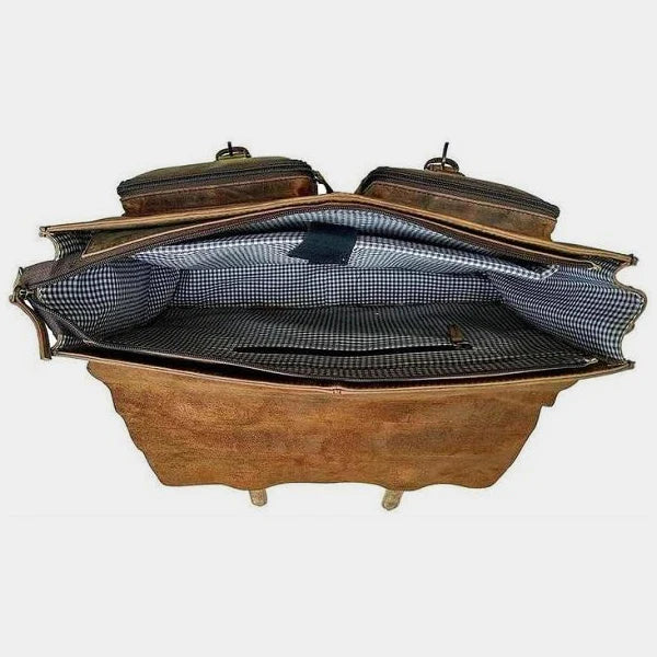 Side profile of a premium buffalo leather messenger bag with adjustable crossbody strap.