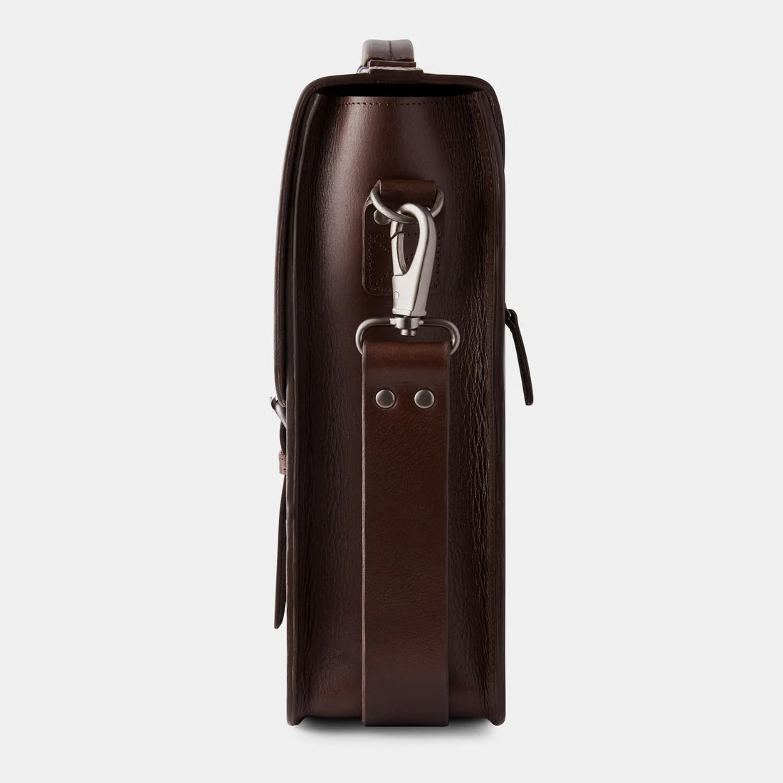 Side profile of premium leather briefcase showcasing full-grain buffalo leather and handcrafted construction.