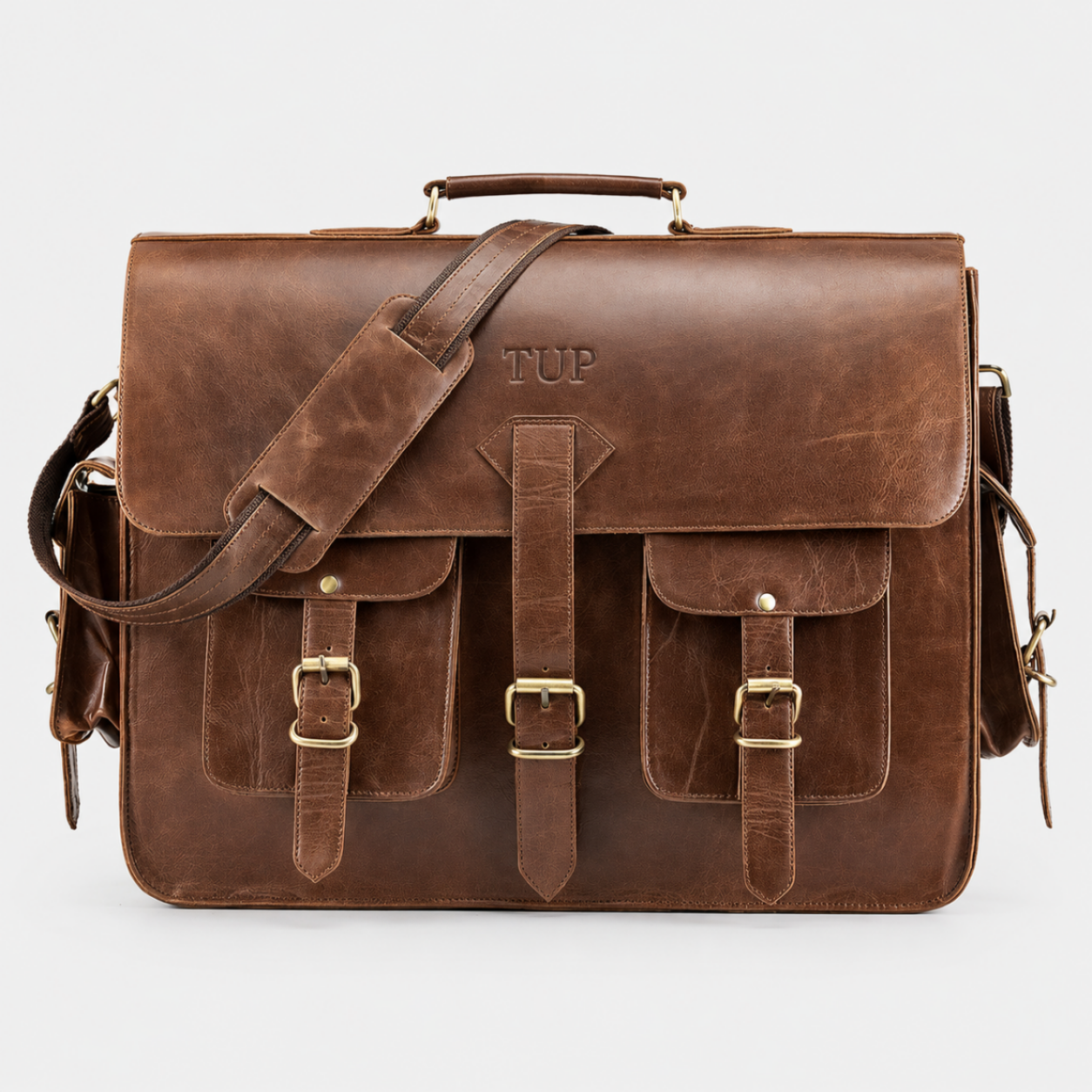 Brown full-grain leather messenger bag with adjustable shoulder strap and secure buckle closure for business professionals.