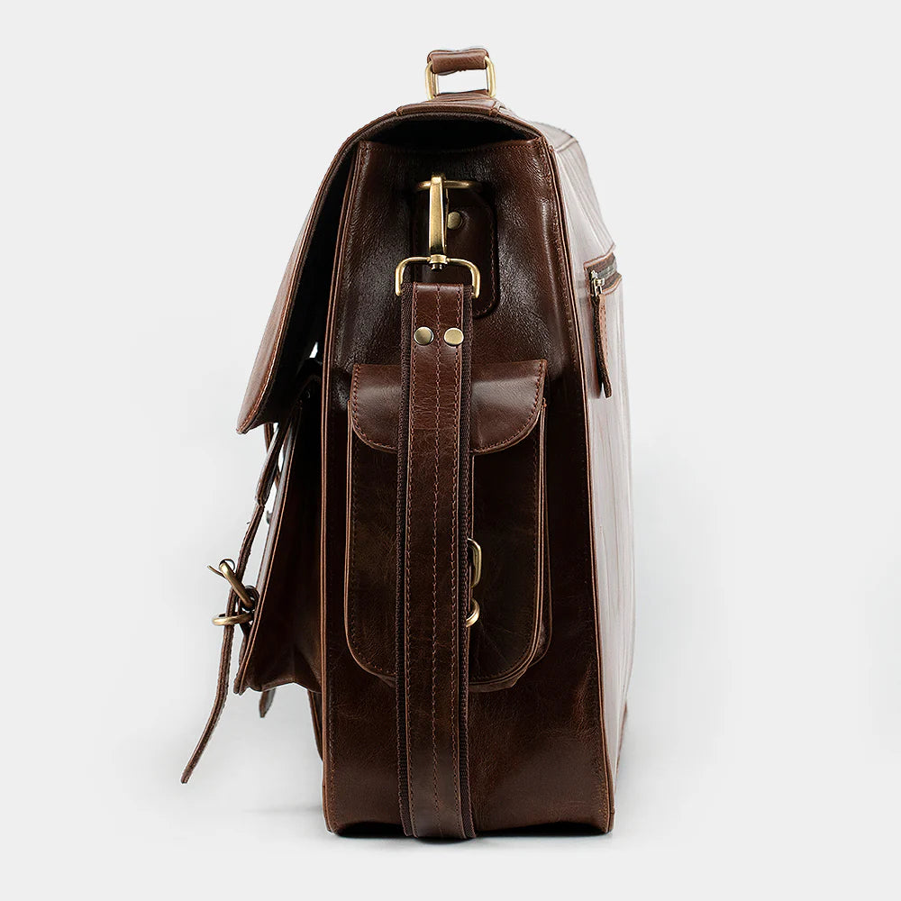 Side profile of premium leather messenger bag highlighting craftsmanship and durable hardware.