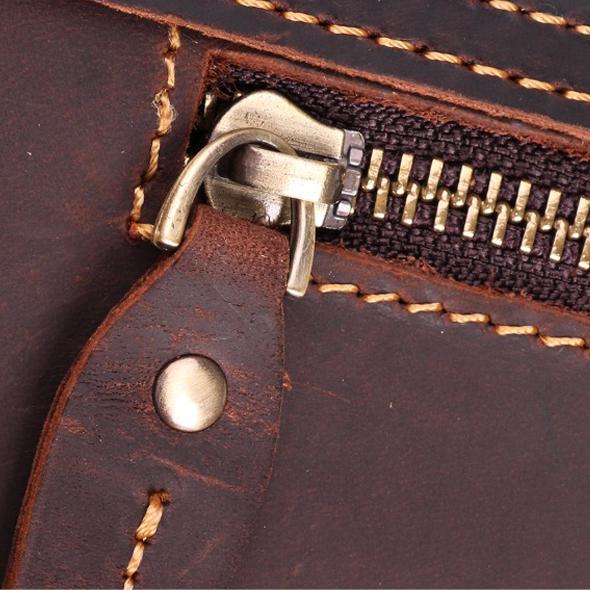 Rear view of handcrafted leather briefcase with clean professional design.