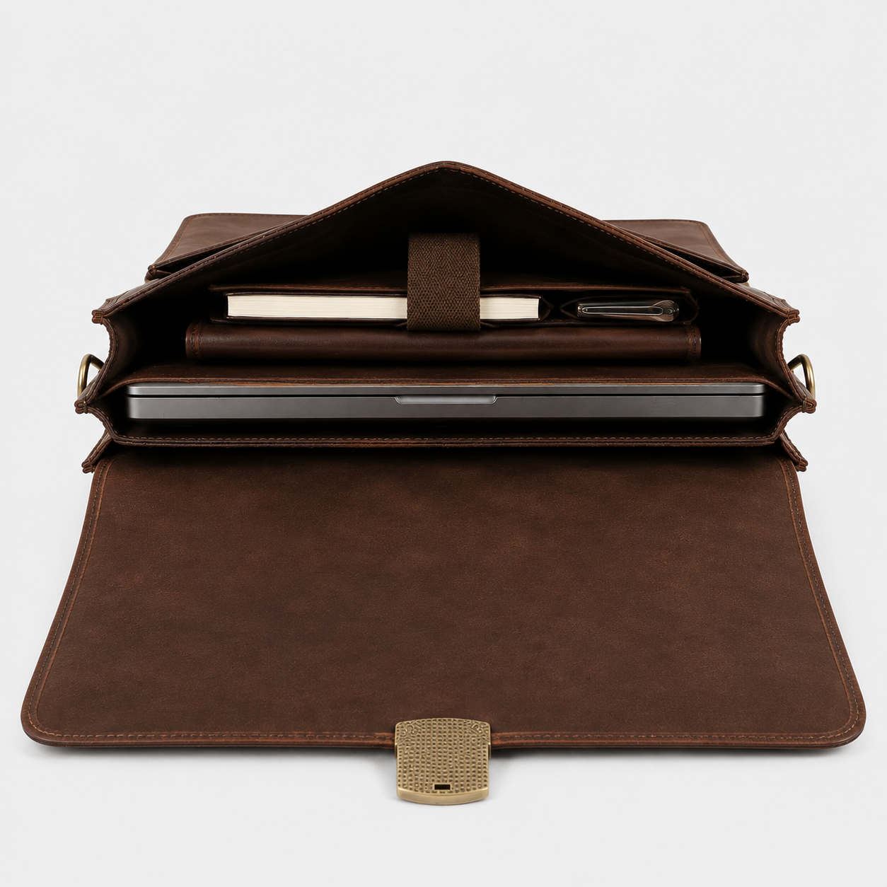 Interior of Rothwell leather briefcase featuring organized compartments and padded laptop sleeve.