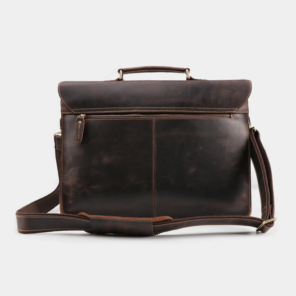 Side profile of Rothwell leather briefcase showing slim executive silhouette.