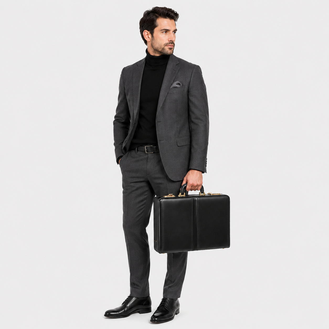 Executive carrying The Sovereign leather briefcase during business travel.
