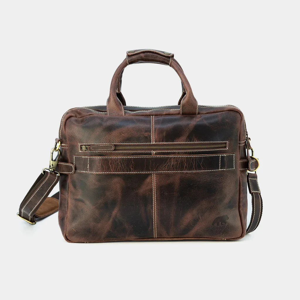 Back view of a leather work bag with reinforced handles and a structured, professional silhouette.