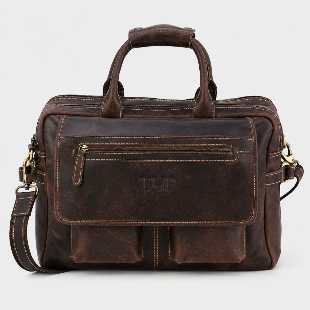 Brown leather work bag handcrafted from premium water buffalo leather with front organizer pockets and adjustable shoulder strap.