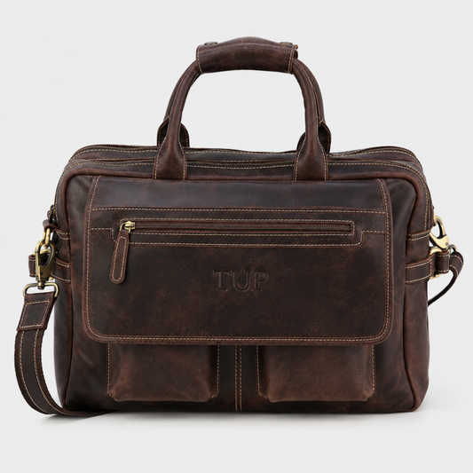 Brown leather work bag handcrafted from premium water buffalo leather with front organizer pockets and adjustable shoulder strap.