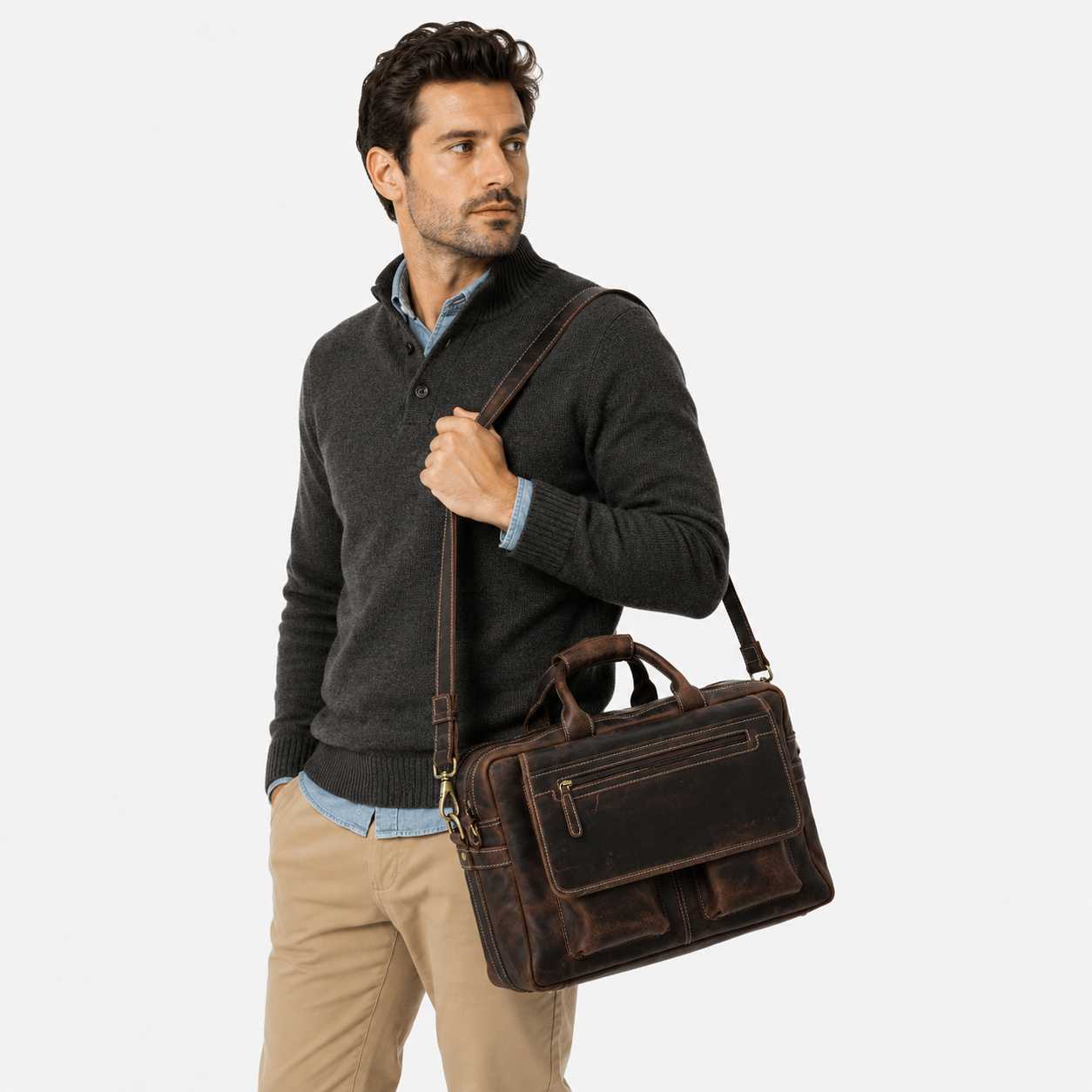 Professional carrying a brown leather work bag for office and business travel.