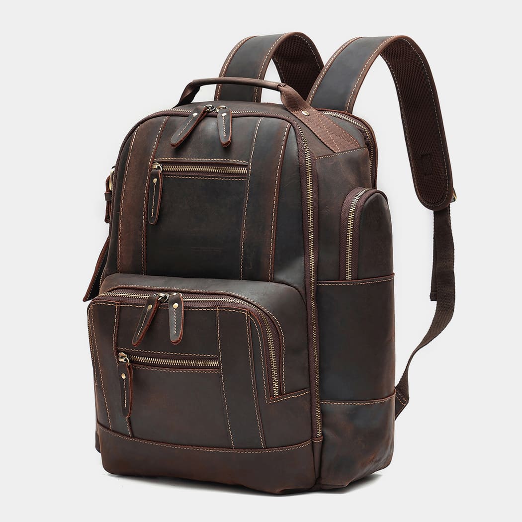 Side profile of handcrafted leather travel backpack with expandable storage