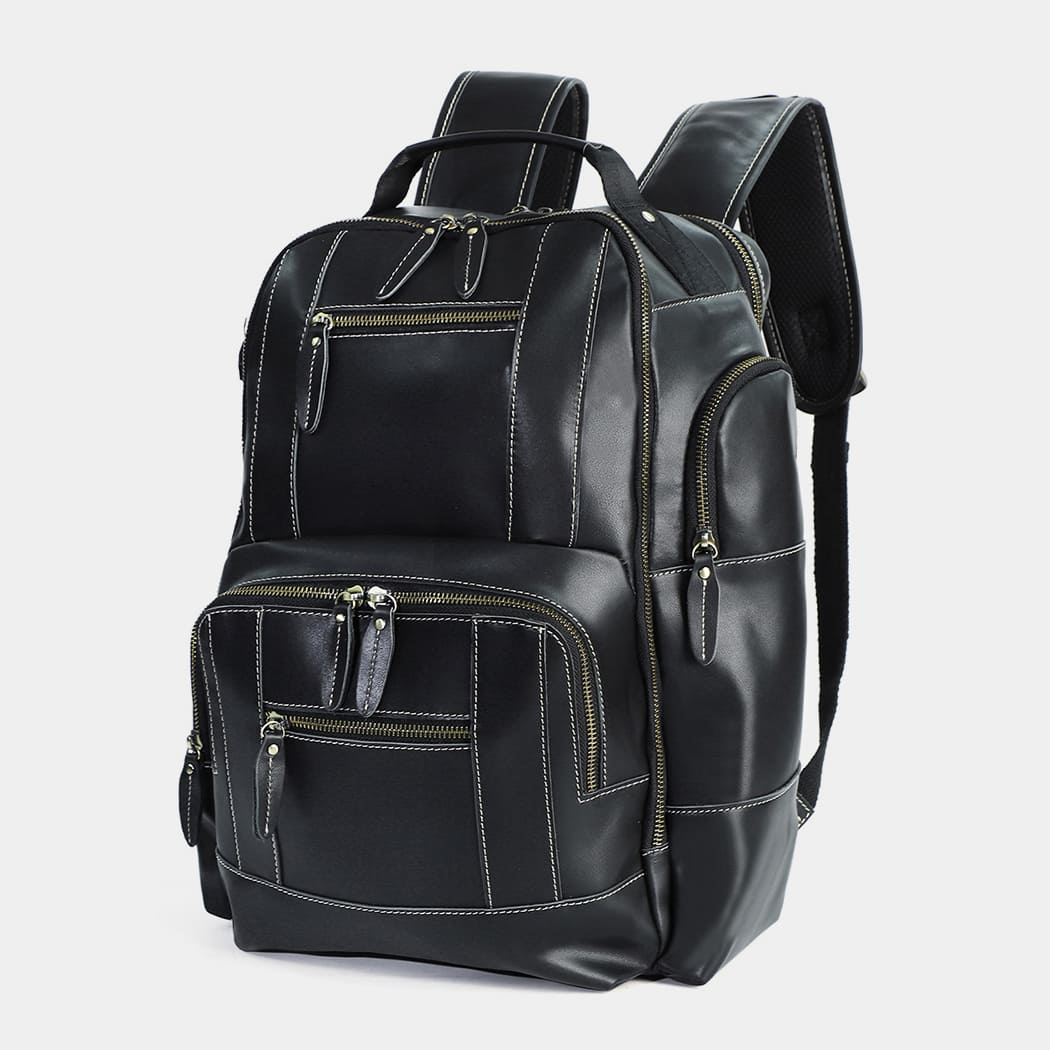 Side profile of handcrafted leather travel backpack with expandable storage