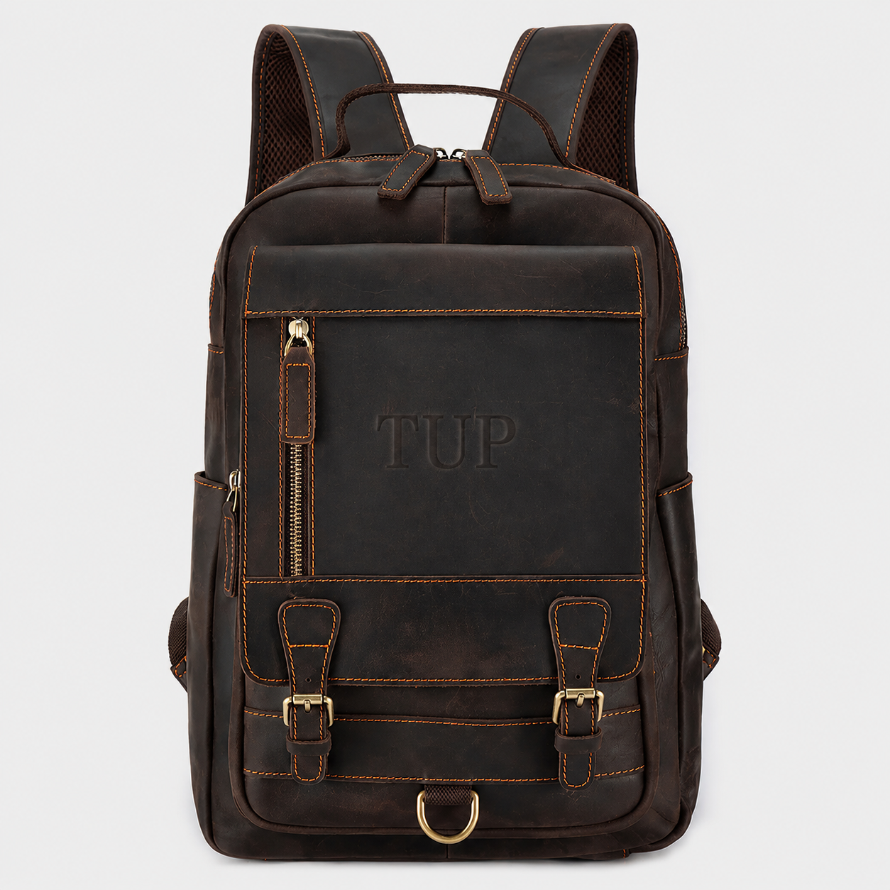 The District full grain leather backpack in dark brown with minimalist design and premium brass hardware