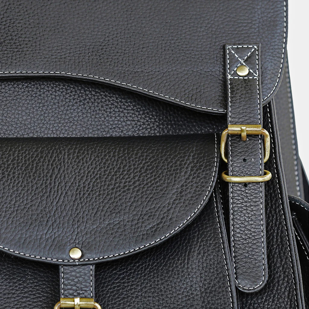 Close-up of premium brass buckle and handcrafted buffalo leather detailing
