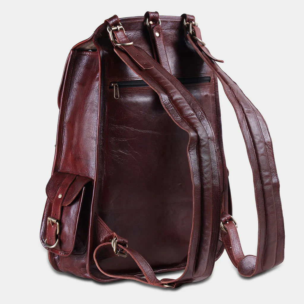 Side profile of The Frontier leather backpack showing premium buffalo leather craftsmanship