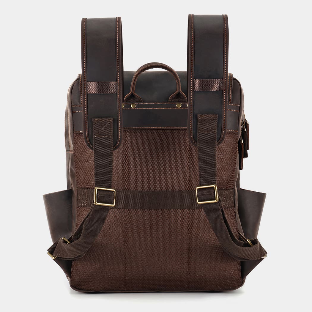 Leather backpack attached to rolling luggage using rear luggage sleeve