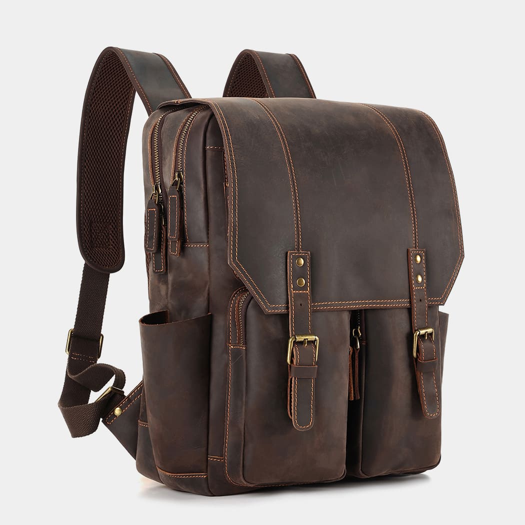 Side profile of The Highland leather backpack with adjustable shoulder straps and premium leather finish