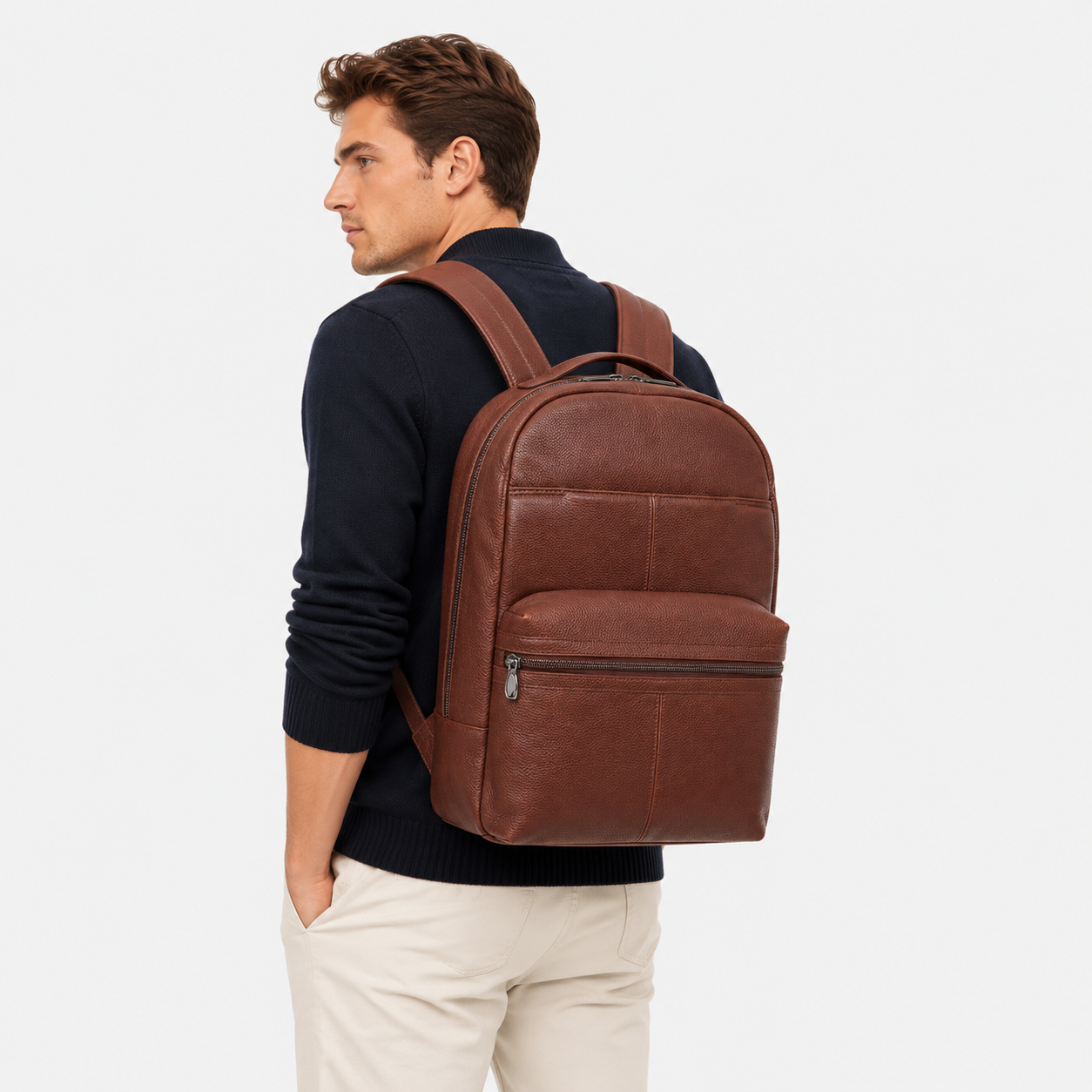 Professional carrying The Lincoln leather backpack during business travel