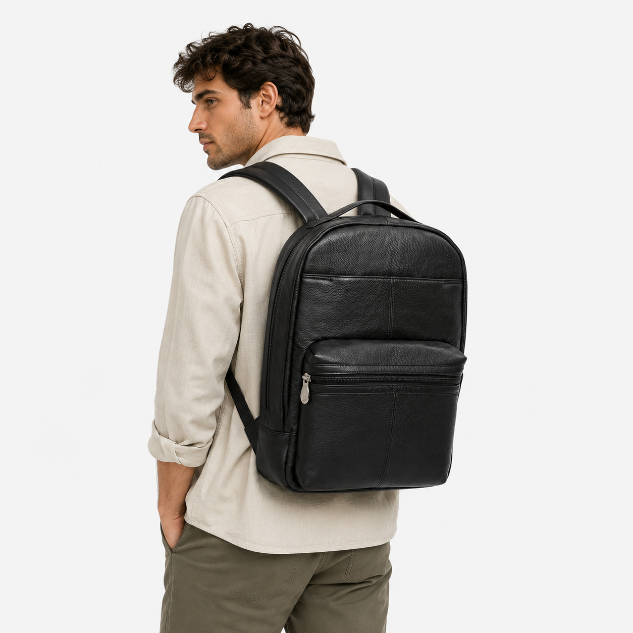 Professional wearing The Lincoln black leather backpack for office commuting