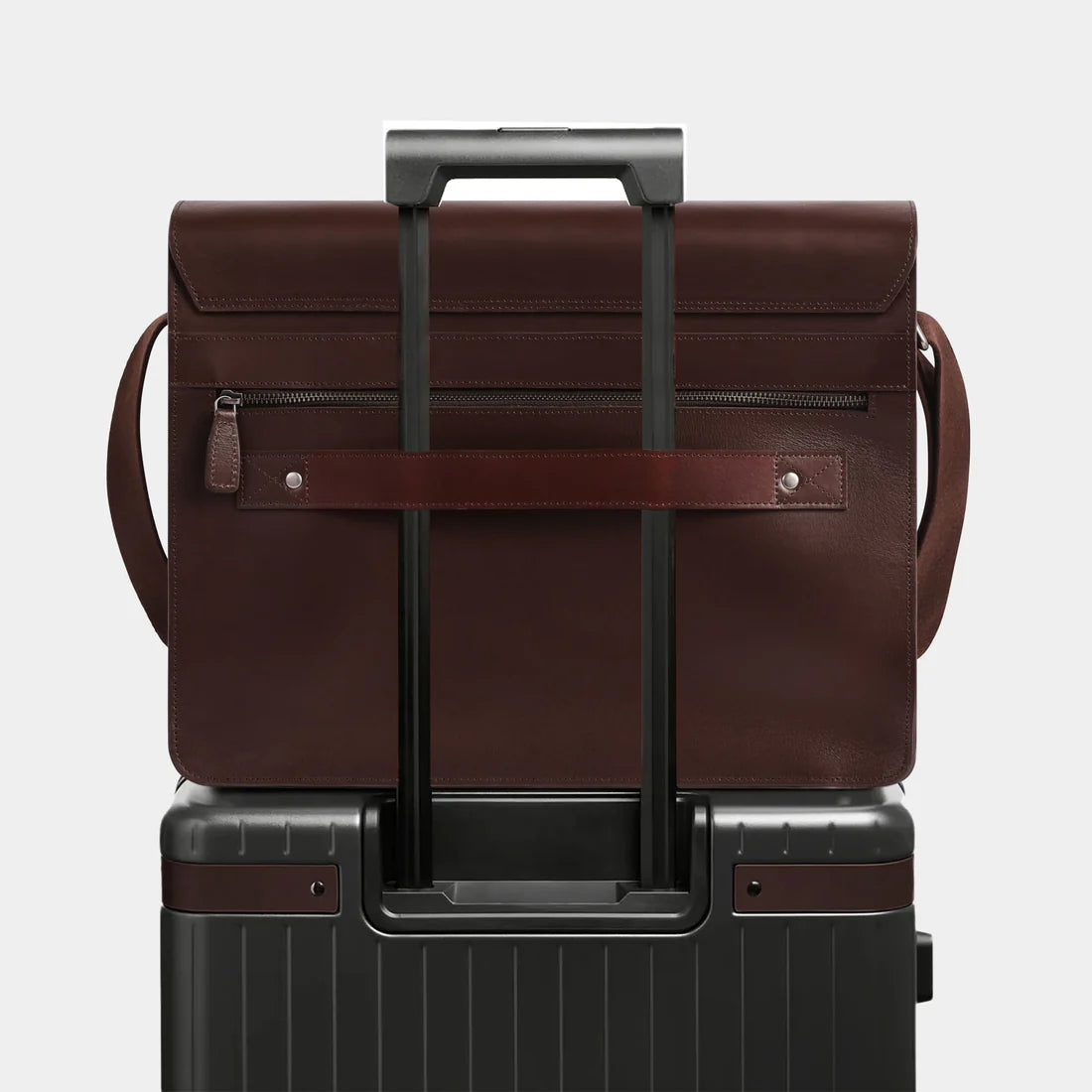 Rear view of The Mercer leather work bag with luggage strap for business travel
