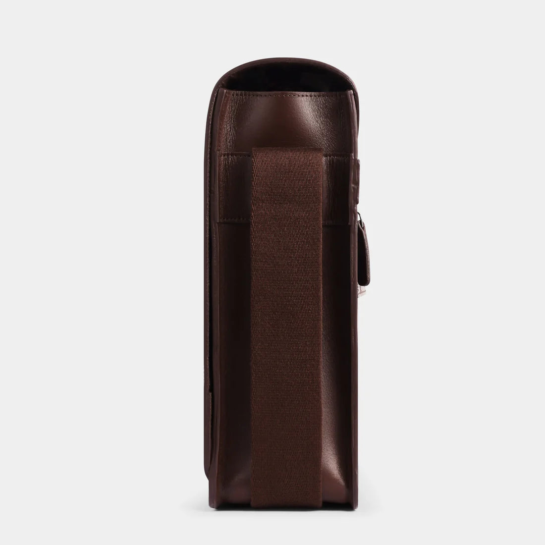 Side profile of handcrafted leather messenger bag with slim professional design