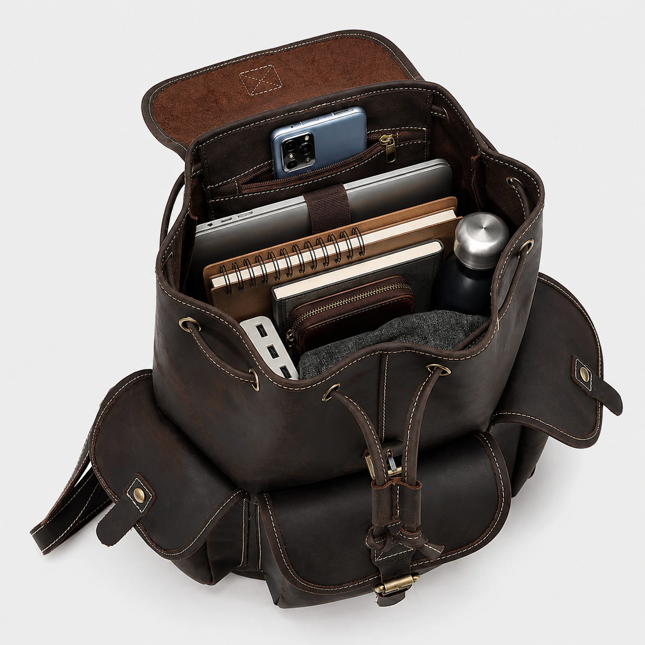 Interior of The Outlander backpack featuring a padded laptop sleeve and spacious storage