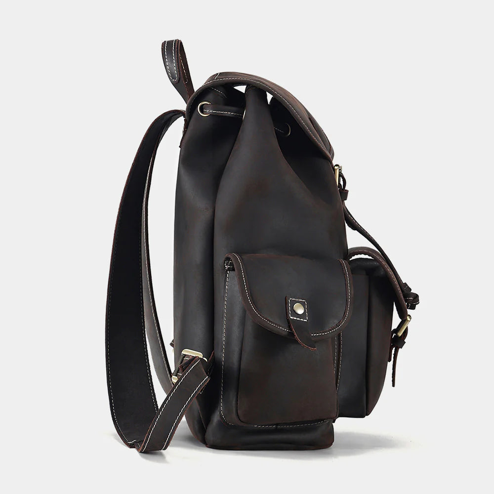 Side profile of premium leather backpack with heritage-inspired design
