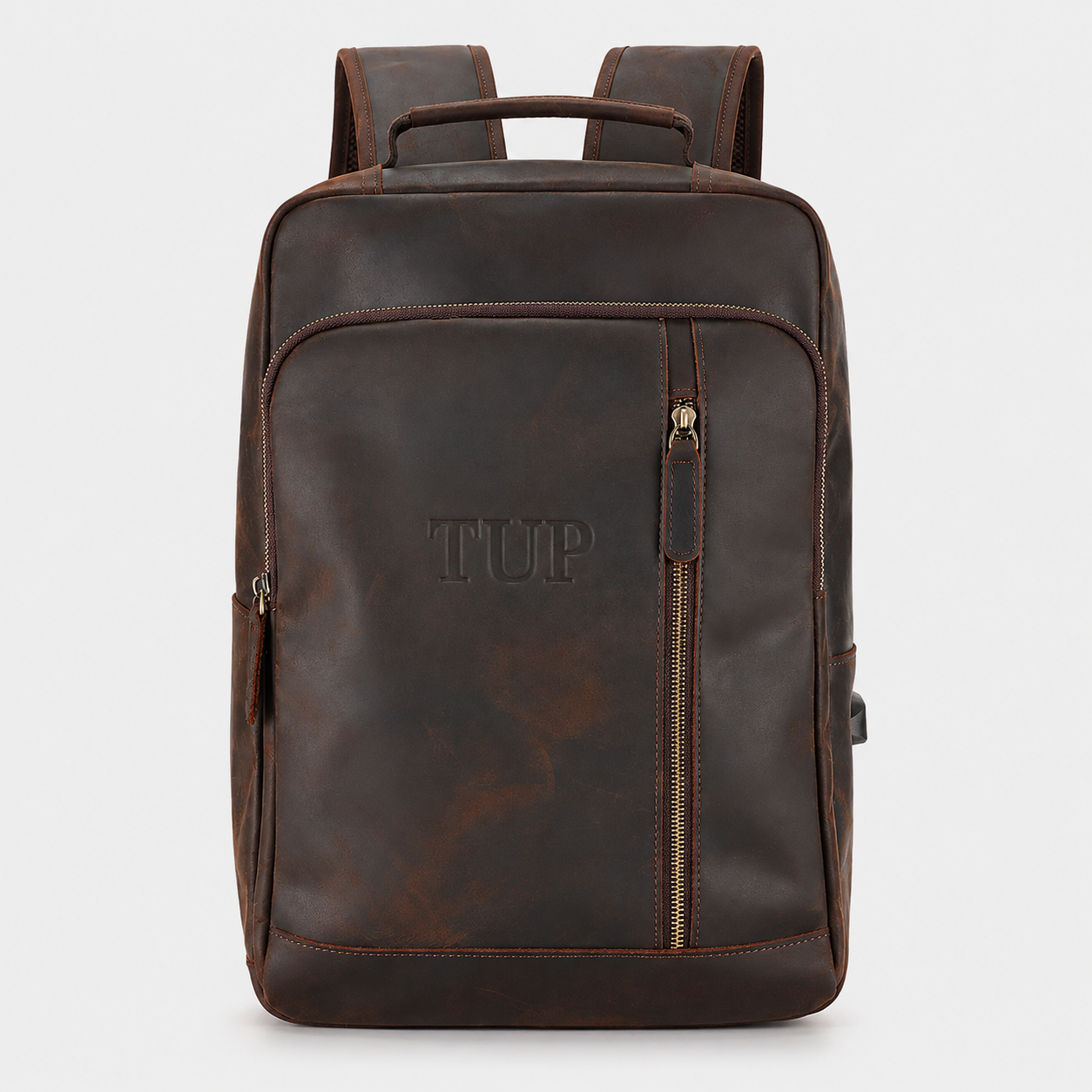Rear view of leather backpack with breathable padded back panel and adjustable shoulder straps