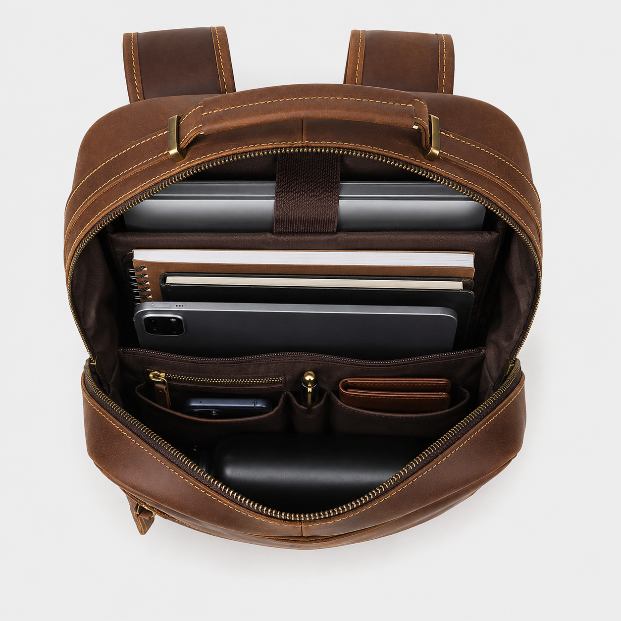 Interior of The Sterling backpack with padded laptop compartment and organized storage
