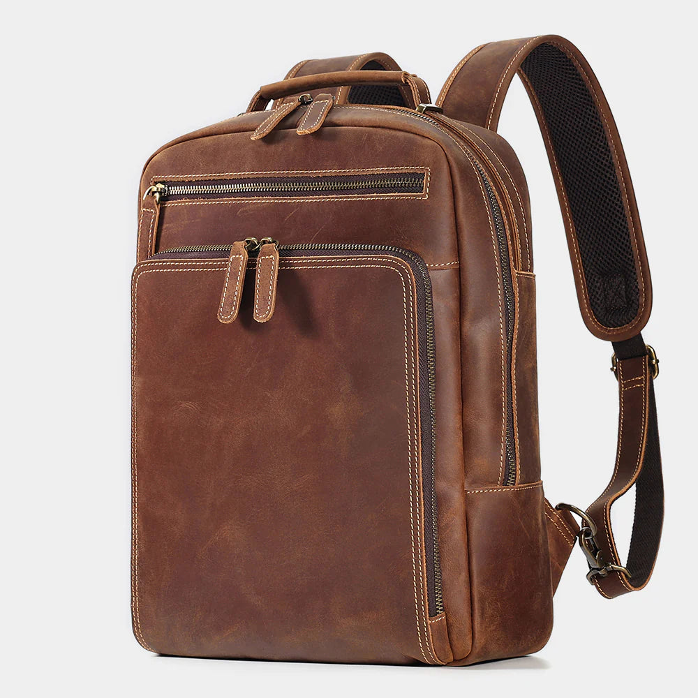 Side view of The Sterling leather backpack showing slim professional profile