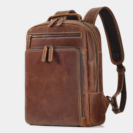 Side view of The Sterling leather backpack showing slim professional profile