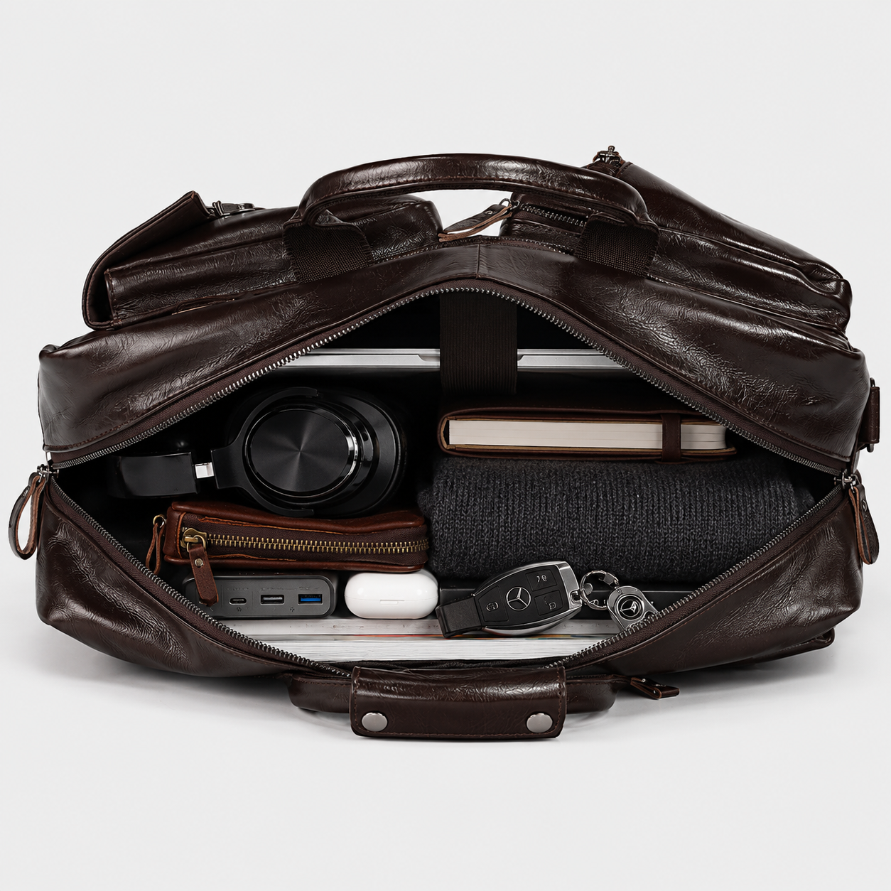 Spacious interior of the Voyager Pro leather bag with padded 17.3-inch laptop compartment